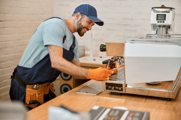 Technician repairing a dishwasher in Cape Town