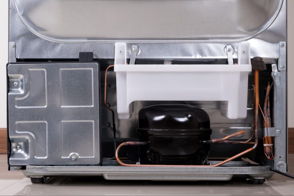 Refrigerator door open showing cooling